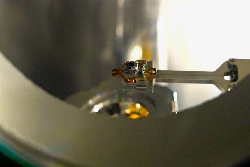 Close-up of a molecular tool and sample stage inside a CBN Nano ultra-high-vacuum chamber